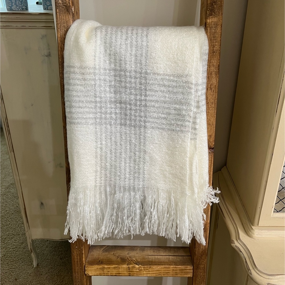 Gray and white blanket